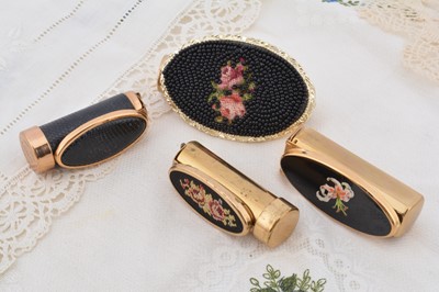Lot 311 - Four black lipstick compacts