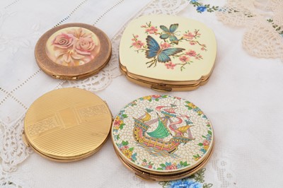 Lot 316 - Four 1960s Kigu gilt compacts