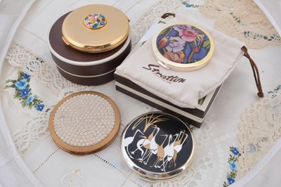 Lot 317 - Four circular Stratton compacts
