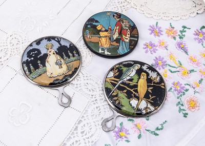 Lot 326 - Two Gwenda Art Deco foil hand mirrors