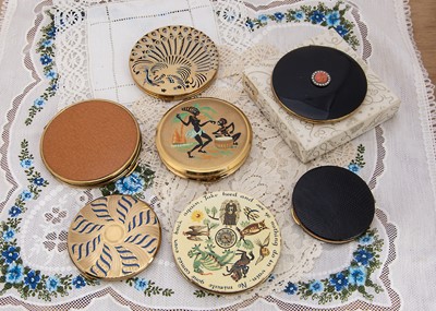 Lot 334 - Seven circular gilt metal Kigu compacts