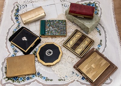 Lot 335 - Barrel gilt metal Kigu lipstick compacts
