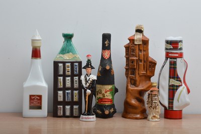 Lot 654 - A collection of novelty alcohol decanters