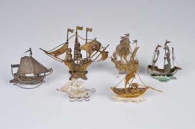 Lot 368 - Six silver and other small models of ships and galleons