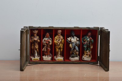 Lot 696 - A boxed set of five novelty character whiskey decanters