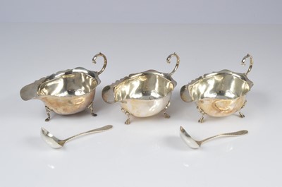 Lot 397 - An harlequin set of three George V silver sauce boats from the Adie Brothers