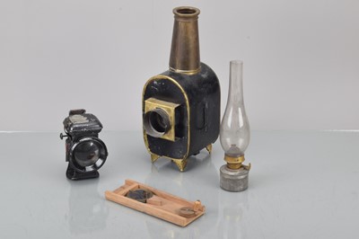 Lot 35 - A Tin Magic Lanter