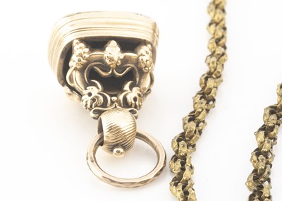 Lot 9 - An Edwardian period gilt metal muff chain