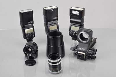 Lot 100 - A Canon FD 28mm f/2 Lens and Canon Accessories