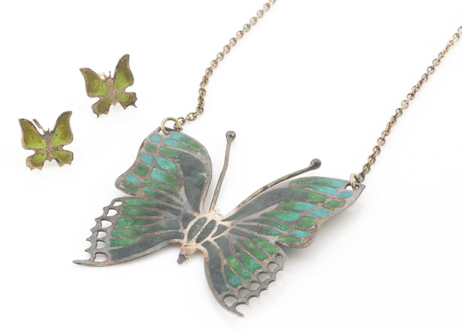 Lot 12 - A silver and enamel butterfly pendant on chain