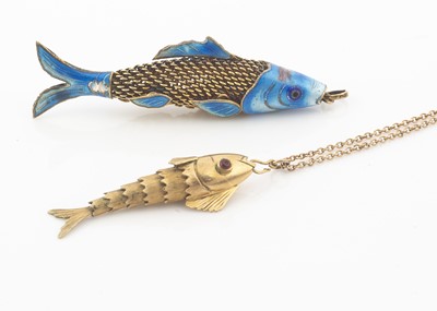 Lot 14 - A silver gilt and enamel fish pendant