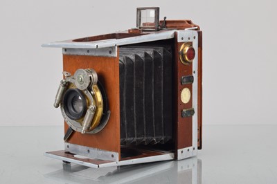 Lot 137 - A Shrew & Co. ''The Xit'' Mahogany & Aluminium Quarter Plate Strut Camera