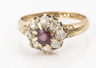 Lot 22 - An Edwardian period 18ct gold cluster ring