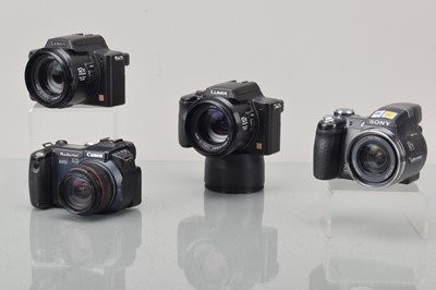 Lot 240 - Four Digital Cameras