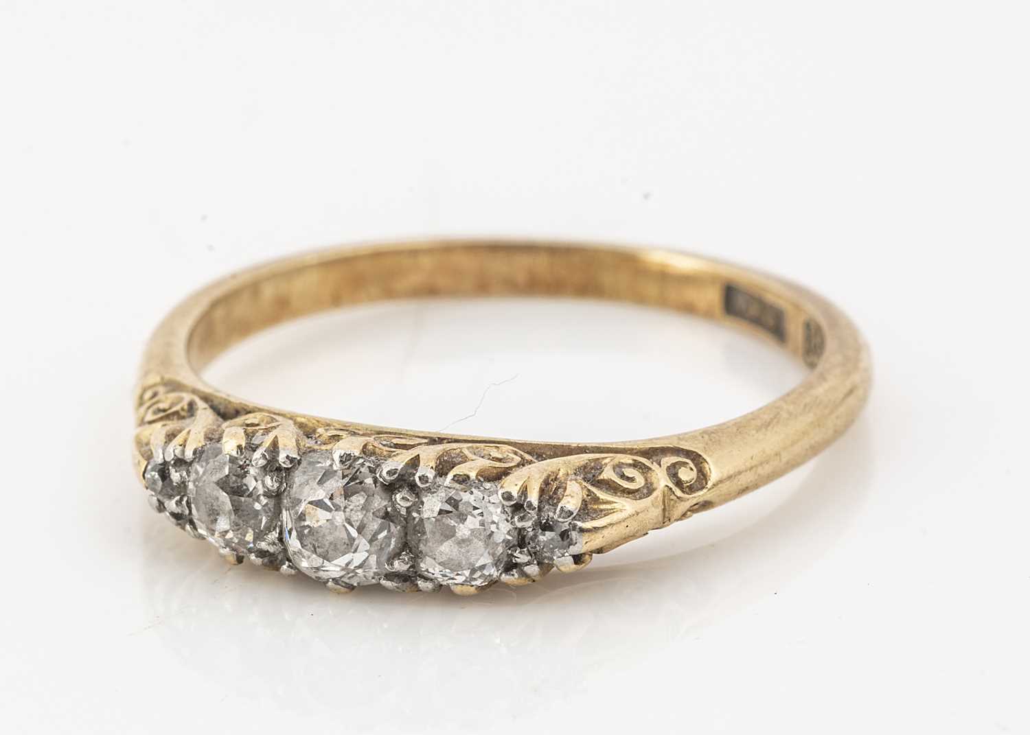 Lot 30 - A Victorian 18ct gold and five stone diamond ring