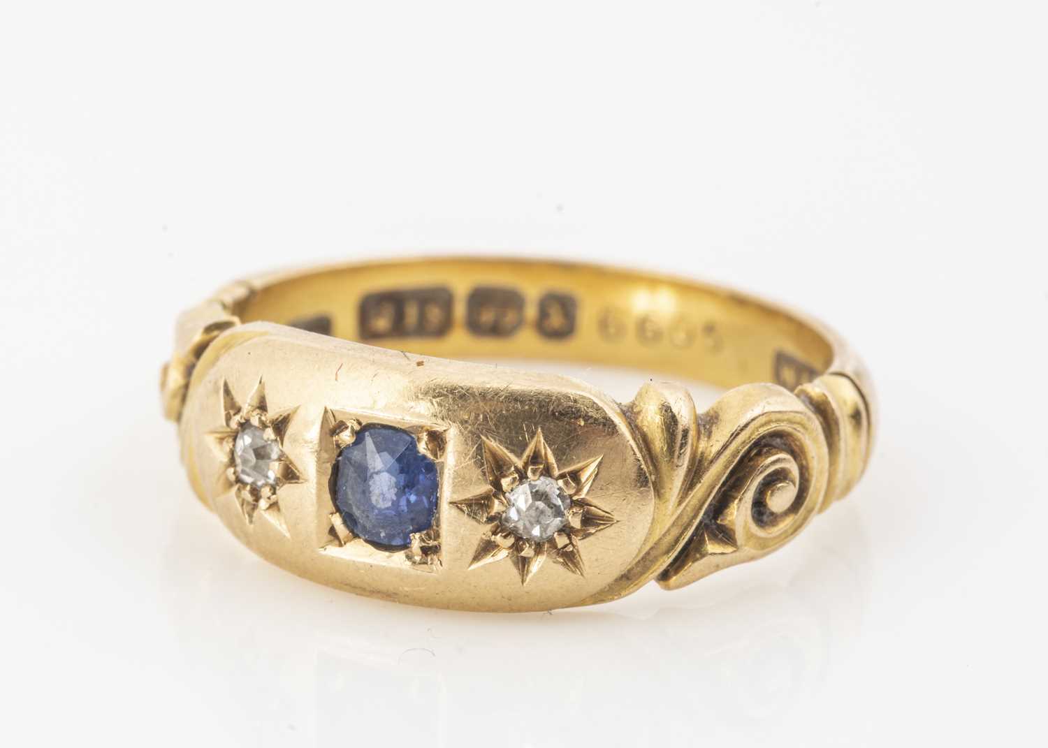 Lot 31 - A late Victorian 18ct gold sapphire and diamond three stone ring
