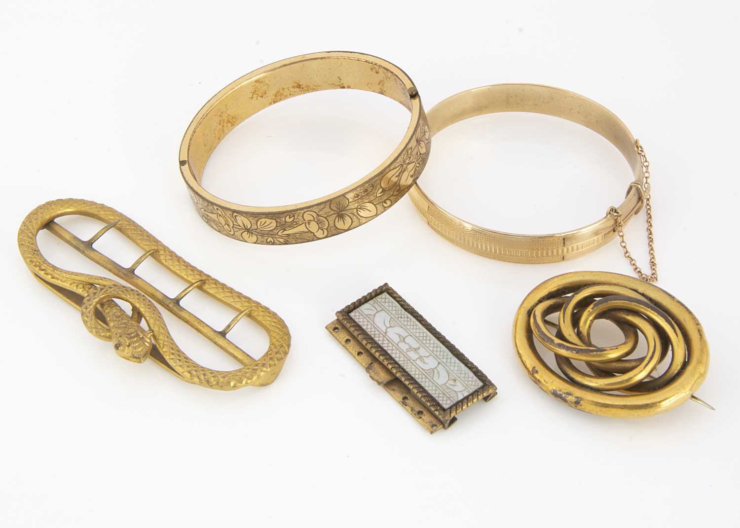 Lot 56 - A late 19th early 20th century hinged gold plated bangle