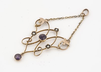 Lot 63 - An Art Nouveau pierced 9ct gold gem set pendant