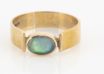 Lot 85 - A contemporary 9ct gold opal ring