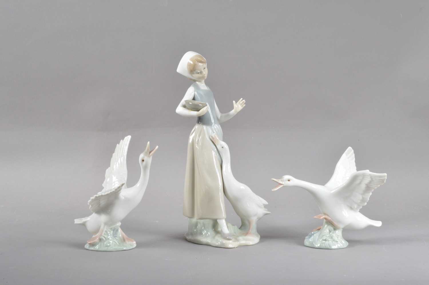 Lot 77 - Three Lladro porcelain figurines