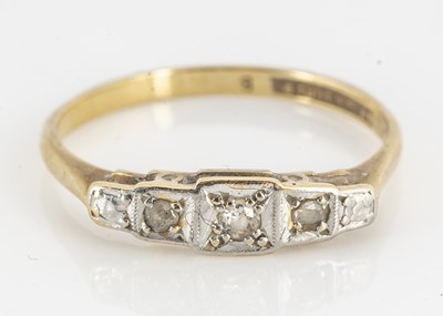 Lot 97 - An Art Deco 18ct gold and platinum three stone dress ring