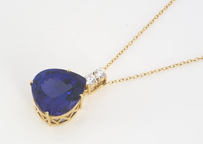 Lot 99 - A large 18ct gold tanzanite and diamond drop pendant
