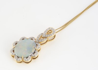 Lot 101 - An 18ct gold and diamond opal pendant