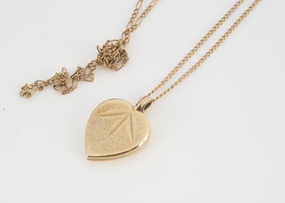 Lot 108 - A 9ct gold heart shaped locket with bale hinge