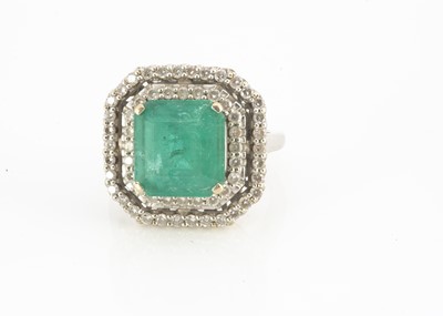 Lot 126 - An Iliana 18ct white gold emerald and diamond dress ring