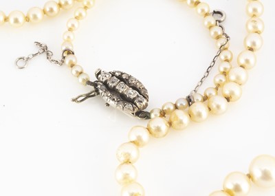 Lot 135 - An early 20th Century graduated and knotted string of cultured pearls