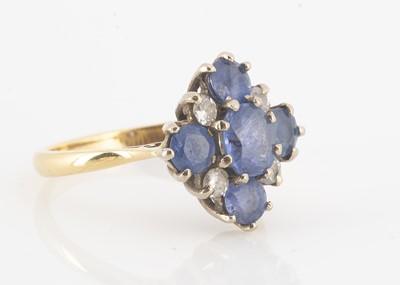 Lot 164 - A sapphire and diamond cruciform cluster ring