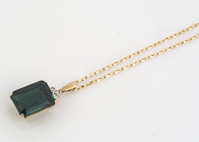 Lot 170 - A synthetic green quartz and diamond drop pendant