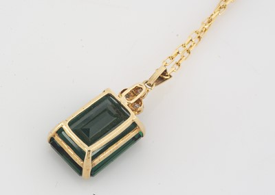Lot 170 - A synthetic green quartz and diamond drop pendant