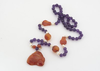 Lot 174 - A Chinese amethyst, carnelian and cultured pearl necklace