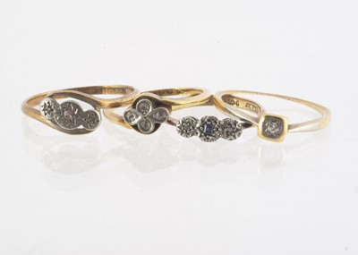 Lot 185 - Four gold diamond and gem set mid 1920s dress rings