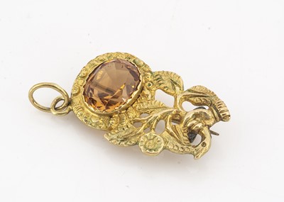Lot 186 - A 19th Century yellow metal (untested) imperial topaz flower and hand brooch