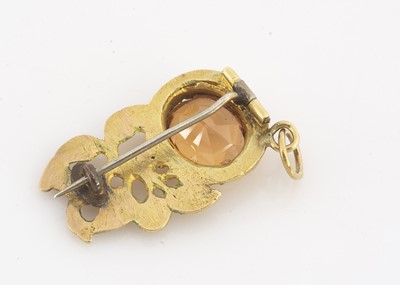 Lot 186 - A 19th Century yellow metal (untested) imperial topaz flower and hand brooch