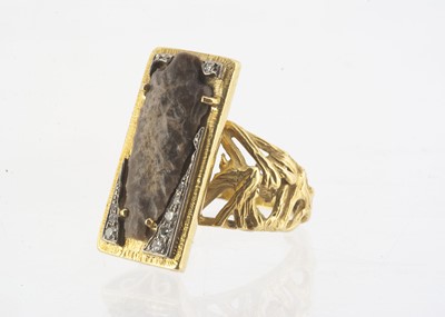 Lot 190 - An 18ct gold Garrard Millennia limited edition neolithic arrow head and diamond tablet ring