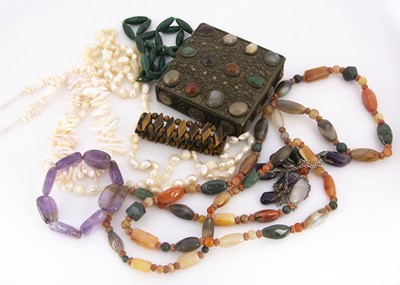 Lot 195 - A collection of ornamental bead necklaces