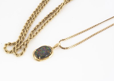 Lot 202 - A 9ct gold opal doublet pendant