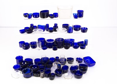Lot 242 - A useful collection of Victorian and later blue glass cruet liners and other glass liners