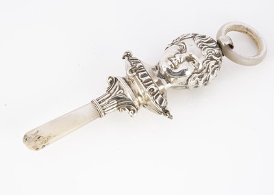 Lot 245 - A George V period silver baby's teether from C&N