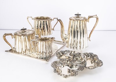 Lot 254 - A late Victorian silver plated four piece tea set and tray