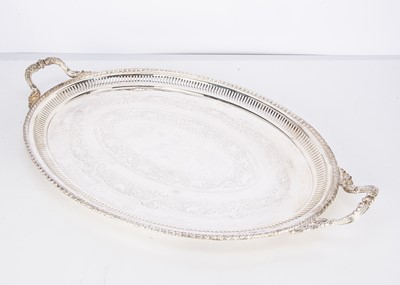 Lot 266 - An Edwardian silver plated oval twin handled tray by JS & S