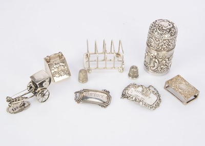 Lot 268 - Nine small collectable items of silver