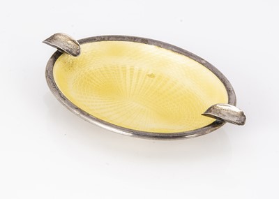 Lot 274 - An Art Deco period yellow enamelled ashtray