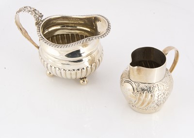 Lot 294 - Two silver jugs