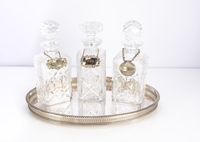 Lot 301 - Three cut glass decanters