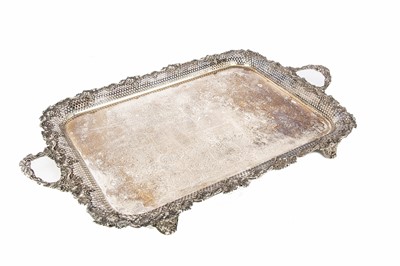 Lot 304 - A large silver plated twin handled tray