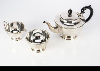 Lot 327 - A 1970s silver three piece tea set by A.E. Jones